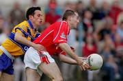 12 June 2005; Niall Geary, Cork, in action against Michael O'Dwyer, Clare. Bank of Ireland Munster Senior Football Championship Semi-Final, Clare v Cork, Cusack Park, Ennis, Co. Clare. Picture credit; Kieran Clancy / SPORTSFILE