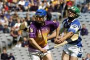 12 June 2005; Brian Campion, Wexford, in action against Damien Culleton, Laois. Guinness Leinster Senior Hurling Championship Semi-Final, Wexford v Laois, Croke Park, Dublin. Picture credit; Pat Murphy / SPORTSFILE