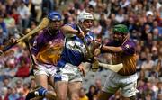 12 June 2005; Liam Tynan, Laois, in action against David O'Connor, left, and Keith Rossiter, Wexford. Guinness Leinster Senior Hurling Championship Semi-Final, Wexford v Laois, Croke Park, Dublin. Picture credit; Pat Murphy / SPORTSFILE
