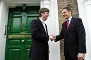 13 June 2005; FAI Chief Executive Officer John Delaney, left, shakes hands with newly appointed Finance Director of the FAI, Mark O'Leary, after a FAI press briefing. FAI Headquarters, Merrion Square, Dublin. Picture credit; David Maher / SPORTSFILE