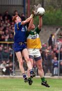 22 May 1997; Ken Kelleghan of Offaly in action against Darren Coffey of Wicklow during the Bank of Ireland Leinster Senior Football Championship Quarter-Final match between Wicklow and Offaly at Croke Park in Dublin. Photo by David Maher/Sportsfile