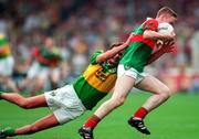 28 September 1997; David Heaney of Mayo is tackled by Maurice Fitzgerald of Kerry during the GAA Football All-Ireland Senior Championship Final match between Kerry and Mayo at Croke Park in Dublin. Photo by Brendan Moran/Sportsfile