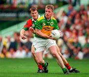 28 September 1997; Eamonn Breen of Kerry in action against John Casey of Mayo during the GAA Football All-Ireland Senior Championship Final match between Kerry and Mayo at Croke Park in Dublin. Photo by Ray McManus/Sportsfile