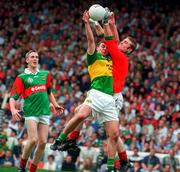 28 September 1997; Mayo goalkeeper Peter Burke in action against Denis O'Dwyer of Kerry during the GAA Football All-Ireland Senior Championship Final match between Kerry and Mayo at Croke Park in Dublin. Photo by Brendan Moran/Sportsfile
