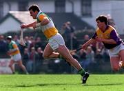23 March 1997; Kevin Martin of Offaly in action against Adrian Fenlon of Wexford during the National Hurling League Division 1 match between Offaly and Wexford at St. Brendan's Park in Birr, Offaly. Photo by David Maher/Sportsfile