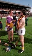 11 July 1993; Liam Dunne of Wexford, right, and DJ Carey of Kilkenny swap jerseys following the Leinster Senior Hurling Championship Final match between Kilkenny and Wexford at Croke Park in Dublin. Photo by Ray McManus/Sportsfile