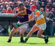 23 March 1997; Larry Murphy of Wexford in action against Martin Hanamy of Offaly during the National Hurling League Division 1 match between Offaly and Wexford at St. Brendan's Park in Birr, Offaly. Photo by David Maher/Sportsfile