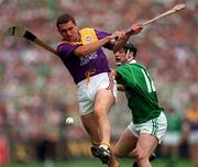 1 September 1996; Larry O'Gorman of Wexford in action against Barry Foley of Limerick during the Guinness All-Ireland Senior Hurling Championship Final match between Wexford and Limerick at Croke Park in Dublin. Photo by Ray McManus/Sportsfile