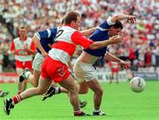 20 July 1997; Larry Reilly of Cavan in action against Kieren McKeever of Derry during the Ulster GAA Football Senior Championship Final match between Cavan and Derry at St. Tiernach's Park in Clones, Monaghan. Photo by David Maher/Sportsfile
