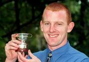29 September 1997; Kerry captain, Liam Hassett with a replica of the Sam Maguire Cup at a reception at the Burlington Hotel in Dublin following their victory over Mayo during the GAA Football All-Ireland Senior Championship Final at Croke Park in Dublin on the 28th of September 1997. Photo by Brendan Moran/Sportsfile