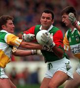 31 August 1997; Liam McHale of Mayo in action against Tom Coffey, left, and Larry Carroll of Offaly during the GAA Football All-Ireland Senior Championship Semi-Final match between Mayo and Offaly at Croke Park in Dublin. Photo by Matt Browne/Sportsfile