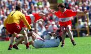 29 June 1997; Matt McGleenan of Tyrone is put under pressure by, from left, Damien McCusker, Sean Lockhart and Kieran Mckeever of Derry during the Ulster GAA Football Senior Championship Semi-Final match between Tyrone and Derry at St. Tiernach's Park in Clones, Monaghan. Photo by David Maher/Sportsfile
