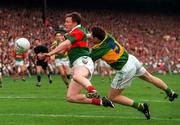 28 September 1997; Diarmuid Byrne of Mayo is tackled by Seamus Moynihan of Kerry during the GAA Football All-Ireland Senior Championship Final match between Kerry and Mayo at Croke Park in Dublin. Photo by Brendan Moran/Sportsfile