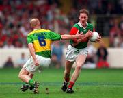 28 September 1997; James Nallen of Mayo evades the challenge by Liam Flaherty of Kerry during the GAA Football All-Ireland Senior Championship Final at Croke Park in Dublin. Photo by David Maher/Sportsfile