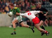 7 September 1997; Noel Kennelly of Kerry is tackled by Ciaran Gourley of Tyrone during the Connacht Minor Football Championship Semi-Final Replay match between Kerry and Tyrpne at Parnell Park in Dublin. Photo by Matt Browne/Sportsfile