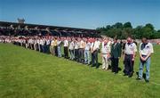 29 June 1997; Players from the Tyrone and Monaghan minoir teams stand for a minutes silence for the late Paul McGirr prior to the Ulster GAA Football Senior Championship Semi-Final match between Tyrone and Derry at St. Tiernach's Park in Clones, Monaghan. Photo by David Maher/Sportsfile