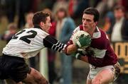 18 January 1998; Padraic Joyce of Galway is tackled by Eamonn O'Hara of Sligo during the FBD Insurance League match between Galway and Sligo at Elverys MacHale Park in Castlebar, Co Mayo. Photo by Matt Browne/Sportsfile