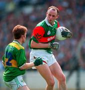 11 August 1996; Pat Holmes of Mayo in action against Billy O'Shea of Kerry during the GAA All-Ireland Senior Football Championship Semi-Final match between Mayo and Kerry at Croke Park in Dublin. Photo by Ray McManus/Sportsfile