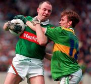 11 August 1996; Pat Holmes of Mayo in action against Billy O'Shea of Kerry during the GAA All-Ireland Senior Football Championship Semi-Final match between Mayo and Kerry at Croke Park in Dublin. Photo by Ray McManus/Sportsfile