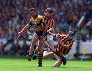 10 August 1997; P.J O'Connell of Clare in action against John Costelloe and Dan O'Neill of Kilkeeny during the Guinness All-Ireland Senior Hurling Championship Semi-Final match between Clare and Kilkenny at Croke Park in Dublin. Photo by Ray McManus/Sportsfile