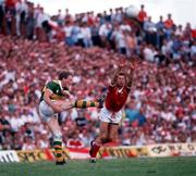 23 July 1989; Pat Spillane of Kerry in action against Anthony Davis of Cork during the Munster Senior Football Championship Final match between Kerry and Cork at Fitzgerald Stadium in Killarney, Kerry. Photo by Ray McManus/Sportsfile
