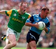 15 June 1997; Paul Curran of Dublin in action against Jimmy McGuinness of Meath during the Leinster GAA Senior Football Championship Quarter-Final match between Offaly and Wicklow at Croke Park in Dublin. Photo by Brendan Moran/Sportsfile
