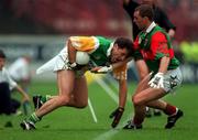 31 August 1997; Peter Brady of Offaly in action against Kenneth Mortimer of Mayo during the GAA Football All-Ireland Senior Championship Semi-Final match between Mayo and Offaly at Croke Park in Dublin. Photo by Ray McManus/Sportsfile