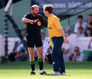 17 August 1997; Referee Joe O'Leary books the Wexford team doctor for encroaching onto the pitch during the GAA All-Ireland Senior Hurling Championship Semi-Final match between Tipperary and Wexford at Croke Park in Dublin. Photo by David Maher/Sportsfile