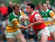 29 June 1997; Ronan Mooney of Offaly in action against Brendan Kerin of Louth during the Leinster GAA Senior Football Championship Semi-Final match between Offaly and Louth at Páirc Tailteann in Navan, Meath. Photo by Ray McManus/Sportsfile