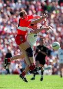 29 June 1997; Seamus Downey of Derry in action against Chris Lawn of Tyrone during the Ulster GAA Football Senior Championship Semi-Final match between Tyrone and Derry at St. Tiernach's Park in Clones, Monaghan. Photo by David Maher/Sportsfile