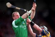 13 April 1997; Stephen McDonagh of Limerick in action against Aidan Flanagan of Tipperary during the National Hurling League Division 1 match between Limerick and Tipperary at  Gaelic Grounds in Limerick. Photo by Brendan Moran/Sportsfile