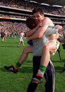 24 August 1997; Stephen Stack of Kerry and Injured Kerry captain Mike Hassett celebrate following the GAA Football All-Ireland Senior Championship Semi-Final match between Cavan and Kerry at Croke Park in Dublin. Photo by Brendan Moran/Sportsfile