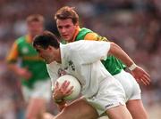 6 July 1997; Tom Harris of Kildare in action against Darren Fay of Meath during the Leinster GAA Senior Football Championship Semi-Final match between Kildare and Meath at Croke Park in Dublin. Photo by Brendan Moran/Sportsfile