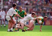 6 July 1997; Tommy Dowd of Meath is tackled by Declan Kerrigan of Kildare during the Leinster GAA Senior Football Championship Semi-Final match between Kildare and Meath at Croke Park in Dublin. Photo by Brendan Moran/Sportsfile