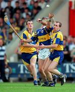6 July 1997; Tommy Dunne of Tipperay in action against Ollie Baker, left, and Liam Doyle of Clare during the GAA Munster Senior Hurling Championship Final match between Clare and Tipperary at Páirc Uí Chaoimh in Cork. Photo by Ray McManus/Sportsfile