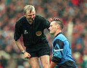 18 September 1994; Referee Tommy Sugrue with Paul Curran of Dublin during the All-Ireland Senior Football Championship Final between Dublin and Down at Croke Park in Dublin. Photo by Ray McManus/Sportsfile