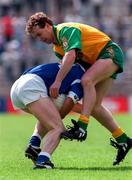 22 June 1997; Tony Boyle of Donegal in action against Damien O'Reilly of Cavan during the Ulster GAA Football Senior Championship Semi-Final match between Cavan and Donegal at St. Tiernach's Park in Clones, Monaghan. Photo by David Maher/Sportsfile