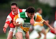 29 June 1997; Vinny Claffey of Offaly in action against Ray Rooney of Louth during the Leinster GAA Senior Football Championship Semi-Final match between Offaly and Louth at Páirc Tailteann in Navan, Co Meath. Photo by Ray McManus/Sportsfile