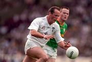 6 July 1997; Willie McCreerey of Kildare in action against Jimmy McGuinness of Meath during the Leinster GAA Senior Football Championship Semi-Final match between Kildare and Meath at Croke Park in Dublin. Photo by Brendan Moran/Sportsfile