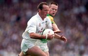 6 July 1997; Willie McCreerey of Kildare is tackled by Jimmy McGuinness of Meath during the Leinster GAA Senior Football Championship Semi-Final match between Kildare and Meath at Croke Park in Dublin. Photo by Brendan Moran/Sportsfile