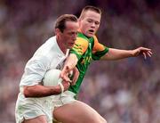 6 July 1997; Willie McCreerey of Kildare is tackled by Jimmy McGuinness of Meath during the Leinster GAA Senior Football Championship Semi-Final match between Kildare and Meath at Croke Park in Dublin. Photo by Brendan Moran/Sportsfile