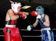 5 March 1999; Aodh Carlyle, left, lands a punch on Eamonn Gillen during the IABA National Boxing Championship Semi-Finals at the National Stadium in Dublin. Photo by Ray Lohan/Sportsfile