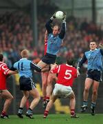 28 March 1999; Brian Stynes of Dublin catches a kickout during the Church and General National Football League Division 1 match between Cork and Dublin at Páirc Uí Rinn in Cork. Photo by Brendan Moran/Sportsfile
