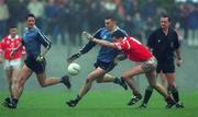 28 March 1999; Ciaran Whelan of Dublin in action against Michael O'Sullivan of Cork during the Church and General National Football League Division 1 match between Cork and Dublin at Páirc Uí Rinn in Cork. Photo by Damien Eagers/Sportsfile