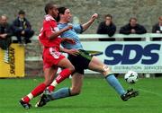 27 September 1998; Clive Delaney of UCD in action against Jason Kabia of Cork City during the Harp Lager National League Premier Division match between UCD and Cork City at Belfield Park in Dublin. Photo by Damien Eagers/Sportsfile