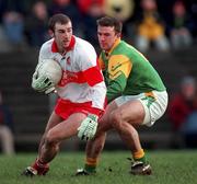 28 February 1999; David O'Neill of Derry in action against Evan Kelly of Meath during the Church and General National Football League Division 1 match between Meath and Derry at Páirc Tailteann in Navan, Meath. Photo by Ray McManus/Sportsfile