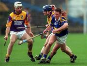 21 March 1999; Declan Browne of Tipperary in action against Colm Kehoe of Wexford during the Church and General National Hurling League Division 1B match between Tipperary and Wexford at Semple Stadium in Thurles, Tipperary. Photo by Damien Eagers/Sportsfile