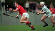 27 March 1999; Diarmuid O'Sullivan of Cork in action against Fergal Hartley of Waterford during the Church and General National Hurling League Division 1B match between Cork and Waterford at Páirc Uí Rinn in Cork. Photo by Brendan Moran/Sportsfile