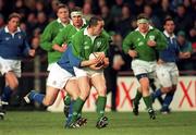 4 January 1997; Conor O'Shea of Ireland is tackled by Marcello Cuttitta of Italy during the International Rugby match between Ireland and Italy at Lansdowne Road in Dublin. Photo by Brendan Moran/Sportsfile