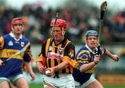 28 March 1999; Johnny Butler of Kilkenny in against Eugene O'Neill of Tipperary during the Church and General National Hurling League Division 1B match between Kilkenny and Tipperary at Nowlan Park in Kilkenny. Photo by Matt Browne/Sportsfile